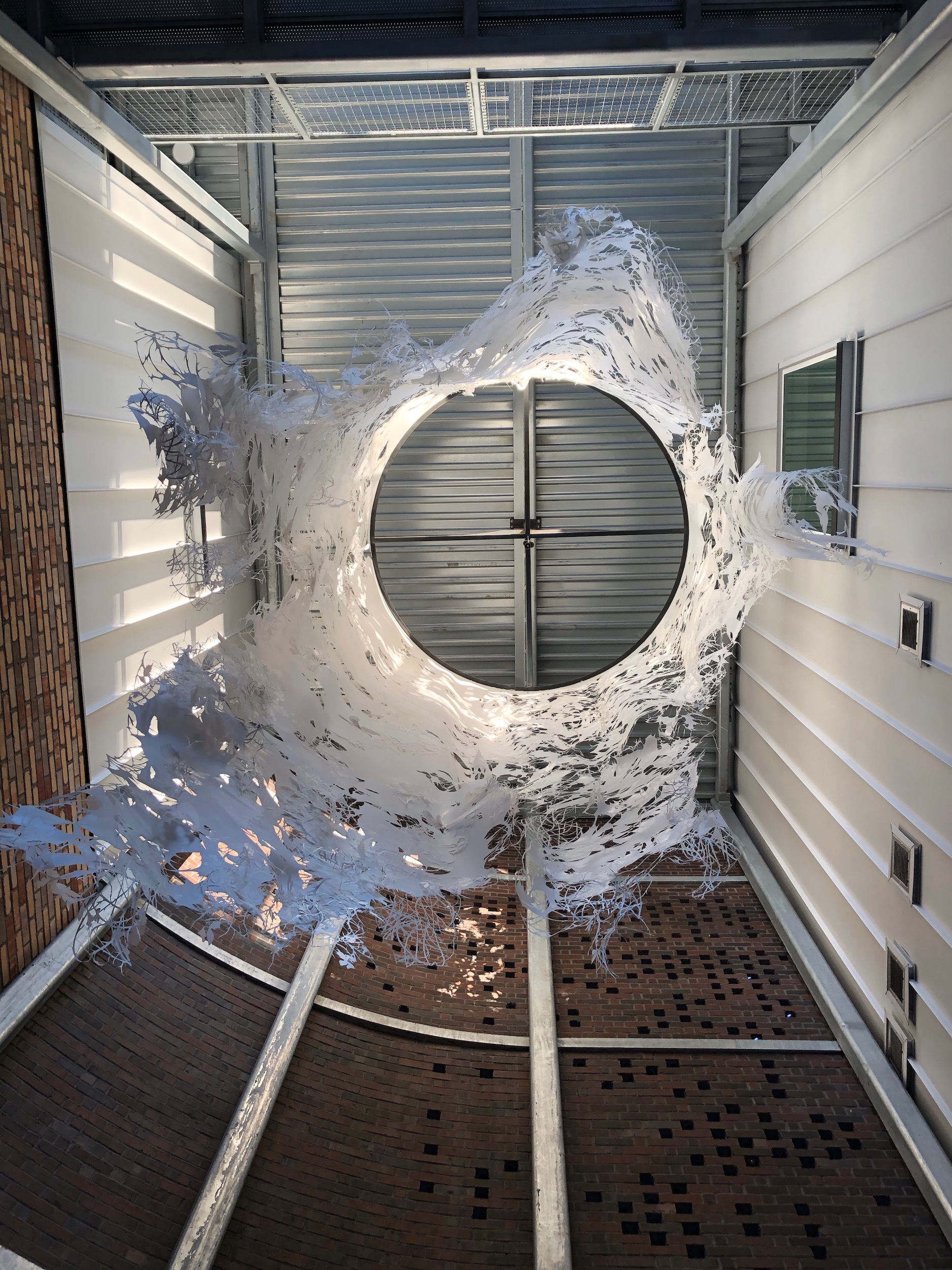 Regan 10 Ever Falling Forest. Steel, hardware, handcut/lasercut mylar, paint. 20 x 8 x 8 feet. 2020. Permanent collection of S*Park Living Community.